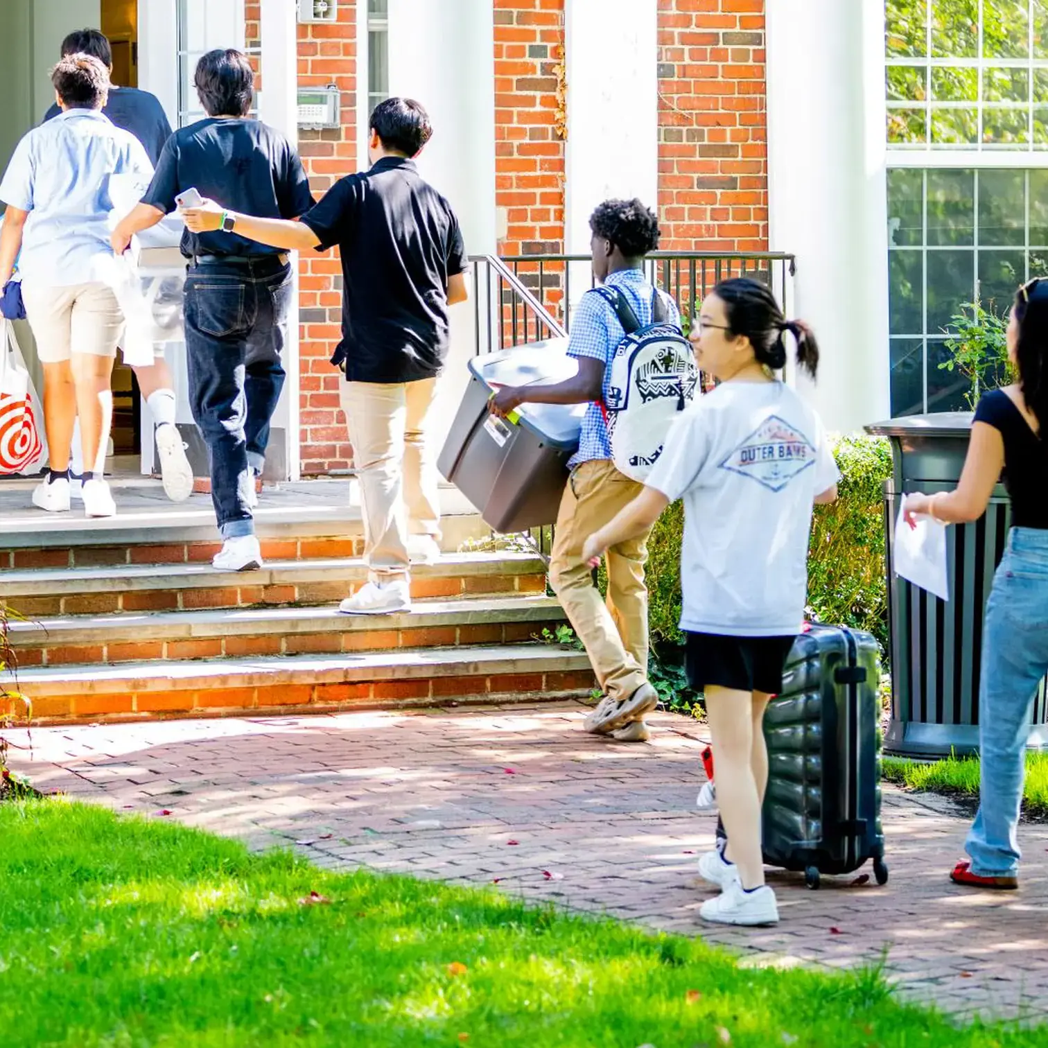 Students moving into a dorm